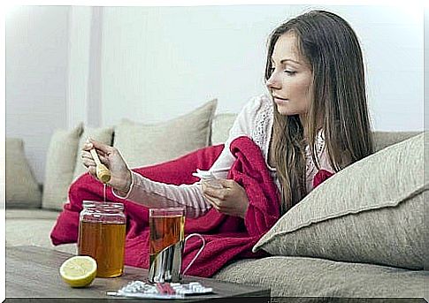 Woman drinking honey before bed