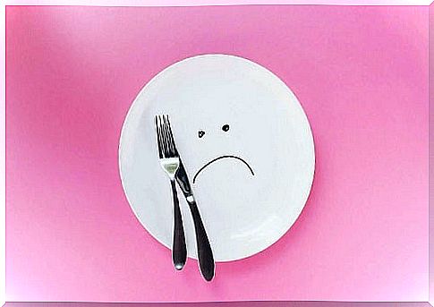 Cutlery on an empty plate