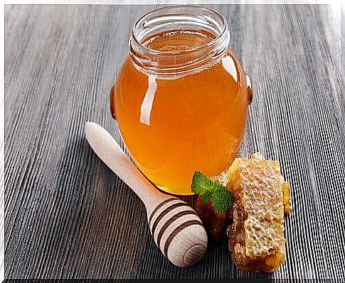 Jar of honey to relieve sore throat