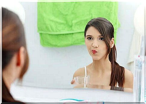 Girl brushing her teeth